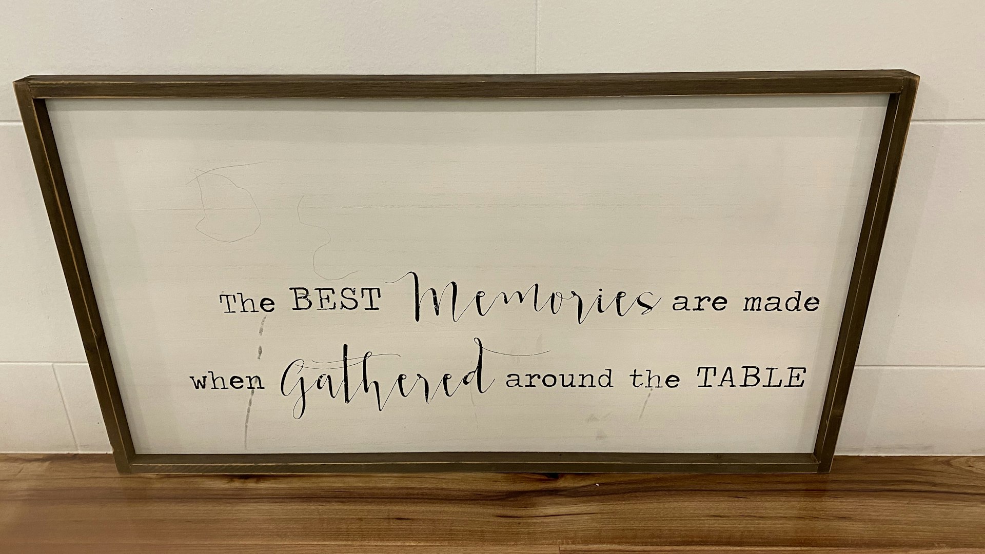 Family gathering around table sharing memories and stories